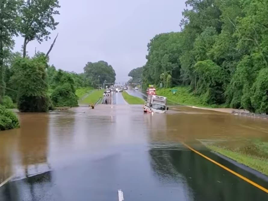 A box truck was carried off the road by floodwaters in Merrifield Monday, July 8.
