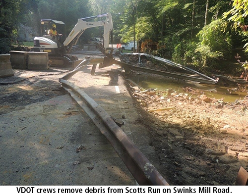 Crews removed debris at Swinks Mill Road and will begin repair work. 