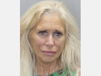 A woman is accused of credit card theft in addition to involvement in a hit-and-run crash Sunday in Fairfax County. 