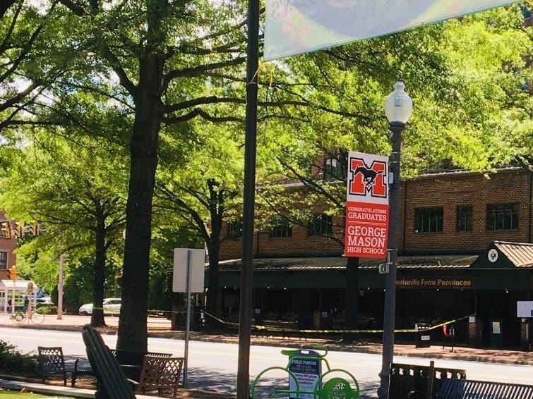 Signs displayed along Broad Street congratulate the George Mason High School class of 2020.