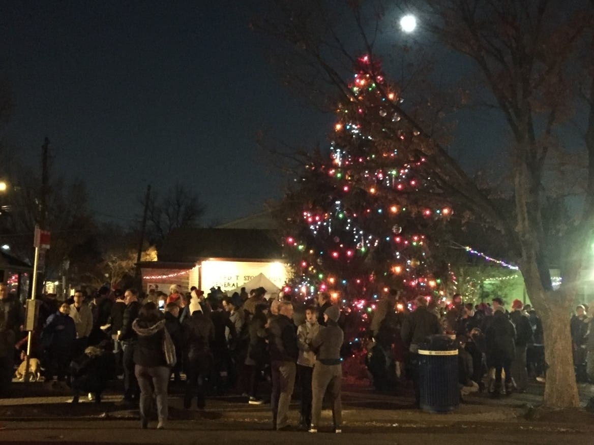 The Del Ray tree lighting, pictured here in a past year, will be held virtually in 2020.