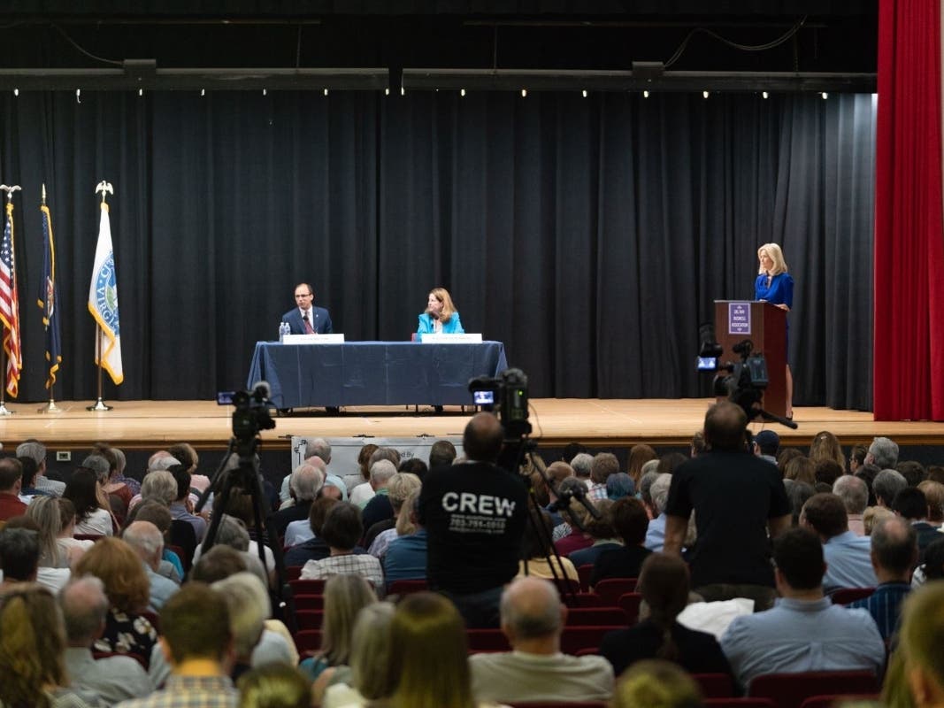 Alexandria Mayor Justin Wilson and former Mayor Allison Silberberg, pictured here during a 2018 debate, will participate in a mayoral debate hosted by the Del Ray Business Association.