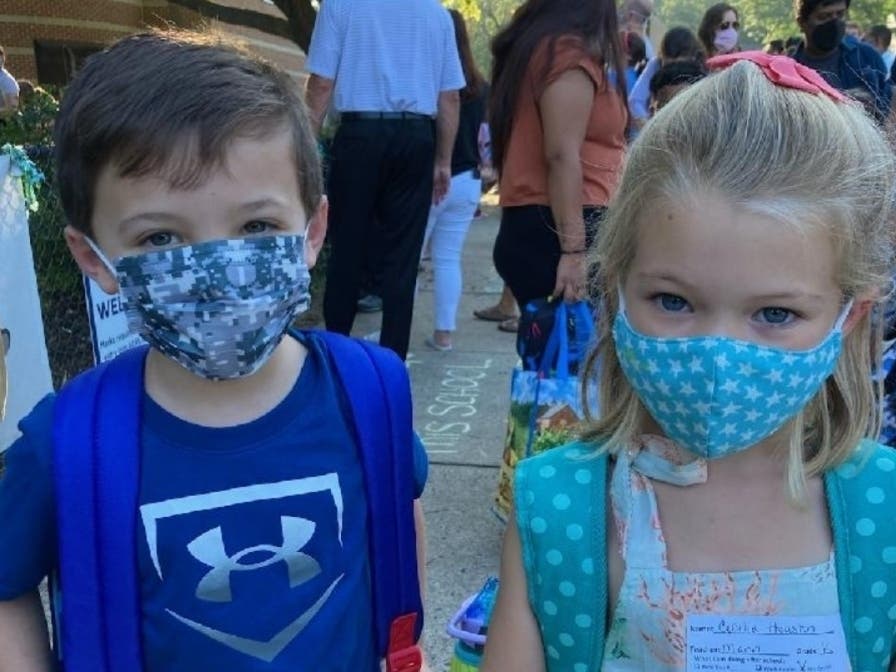 Jacob Lawrence, 5, started kindergarten at ​Charles Barrett Elementary and ran into his cousin, Celia Houston​. She is also starting kindergarten, although with a different teacher.​​