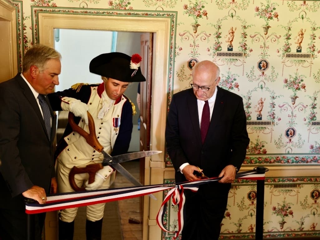 Philippe Etienne, the Ambassador of France to the U.S., (right), joins Mount Vernon CEO Doug Bradburn​ (left) and Marquis de Lafayette reenactor Benjamin Goldman to unveil the restore Lafayette Room. 