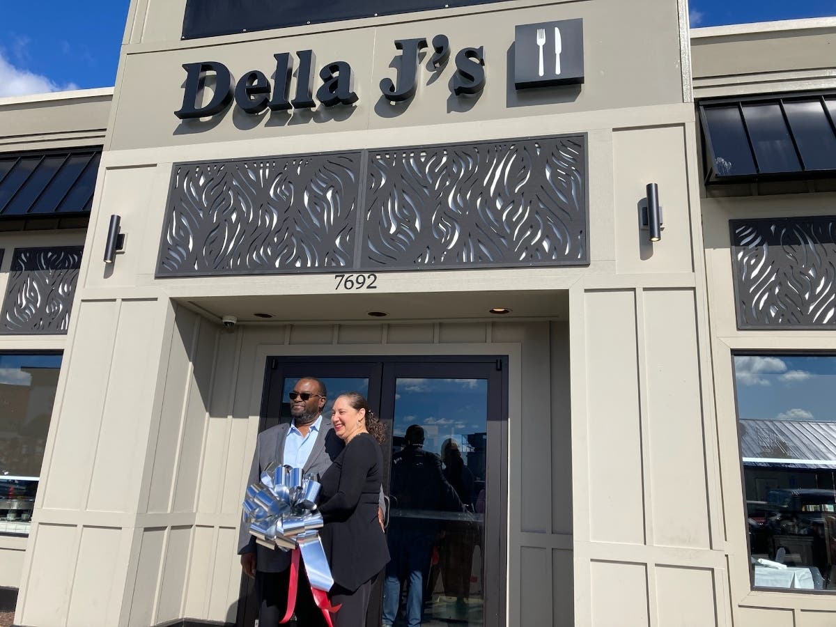 Jerry and Lydia Young celebrated the grand opening of Della J's Delectables in its new space at Mount Vernon Plaza on Wednesday. 