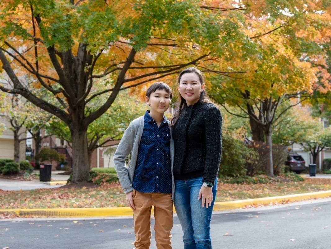 Kilmer Middle School eighth grader Erdem Dulguun and his mother, Bolormaa Jamiyansuren, helped organize a spelling bee for the Mongolian student community happening Saturday in DC. 