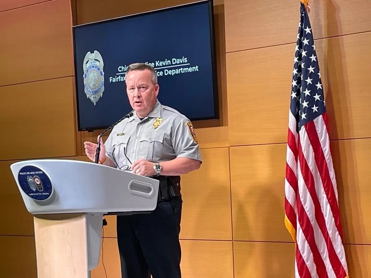 Police Chief Kevin Davis announced an increased reward for the arrest of a homicide suspect in the Woodlawn area.