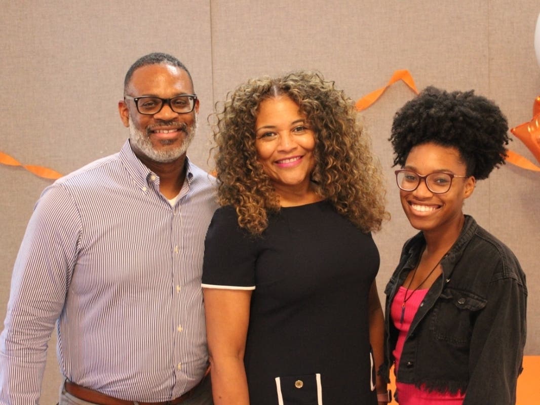 Quenton Rodgers and his wife and daughter, Colette and Paris, were recognized for their volunteer efforts to New Hope Housing, a nonprofit addressing homelessness.