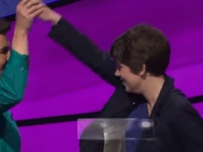 James Holzhauer congratulates Emma Boettcher, who unseated him as champion after a 32-game streak. 