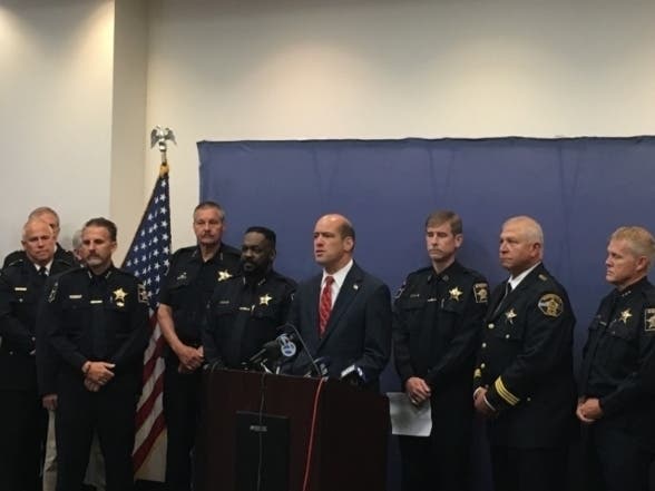 DuPage County State's Attorney Robert Berlin and Sheriff James Mendrick announce the new MERIT task force. 