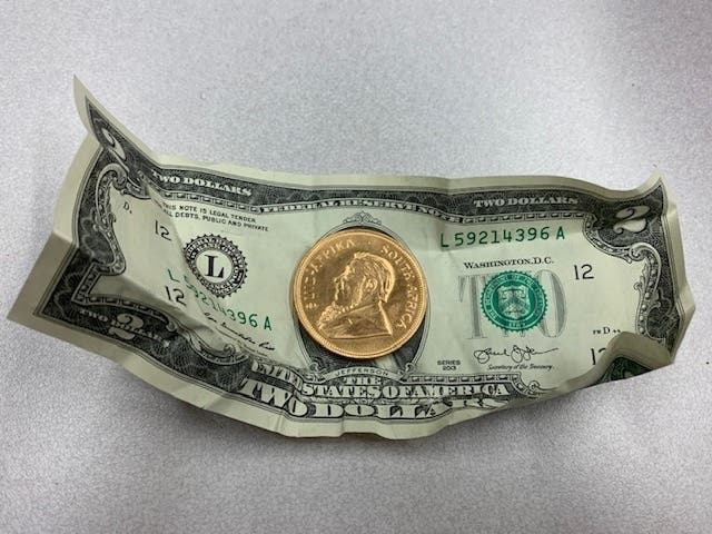 The South African Krugerrand coin was dropped in the red kettle at Casey's Foods Tuesday. 