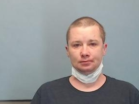 Jason Zell, 32, is accused of using a hatchet to rob the Walgreens at 1601 N. Main St. in Wheaton. 