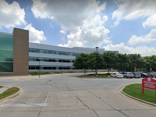 Dozens of parents attended a District 203 Board of Education meeting at Naperville Central High School Monday, pleading for the district to return to full-time in-person instruction. 