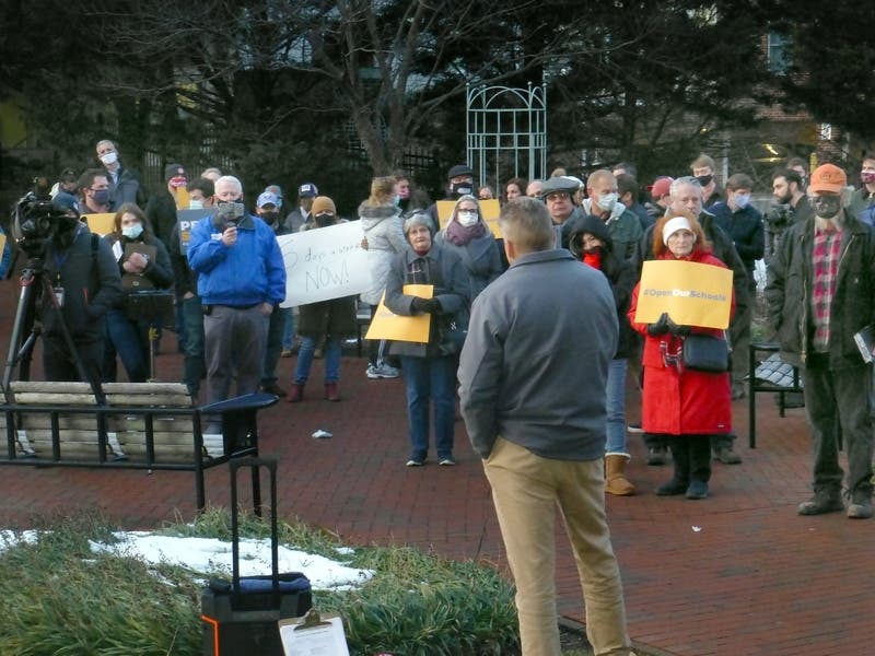 A crowd gathers in Leesburg, Virginia, to rally for full-time, in-person instruction. A similar rally will be held in Glen Ellyn Friday at 3:30 p.m. 