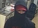 Surveillance footage of a suspect who police say robbed the 7-Eleven at 1663 North Route 59 early Thursday. 