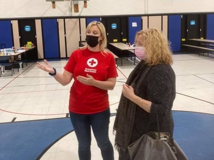 Woodridge Mayor Gina Cunningham tours the tornado resource center at Thomas Jefferson Junior High School, 7200 Janes Ave., Woodridge. 