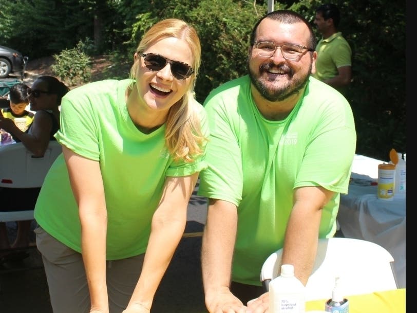 Tatiana Weinstein, Library Director (left) with Xavier Duran, Adult Services Librarian (right) at Lisle Library District's 2019 Summer Reading Wrap-Up Party. 
