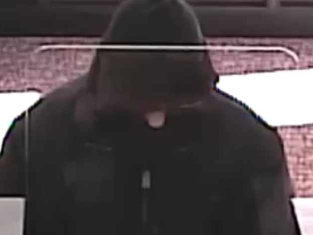 Federal agents say the man pictured above robbed Old Second Bank, 3101 Ogden Ave., Tuesday morning. 