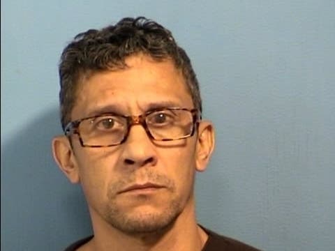 Alberto Gomez, 51, of Arizona, is accused of sexually assaulting a woman in a West Chicago apartment in 2001. 