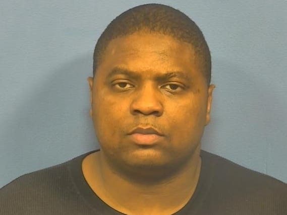 Police say Douglas Thigpen, 36, of Oak Park, fired a gun into a car with a woman inside in June. 