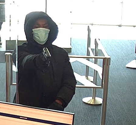 Surveillance footage shows a man sought by FBI Chicago in connection with an armed robbery at Bank of America, 2775 75th St., Naperville. 