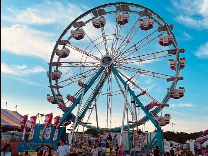 The four-day festival features live tribute bands, house music, carnival rides and family-friendly activities. 