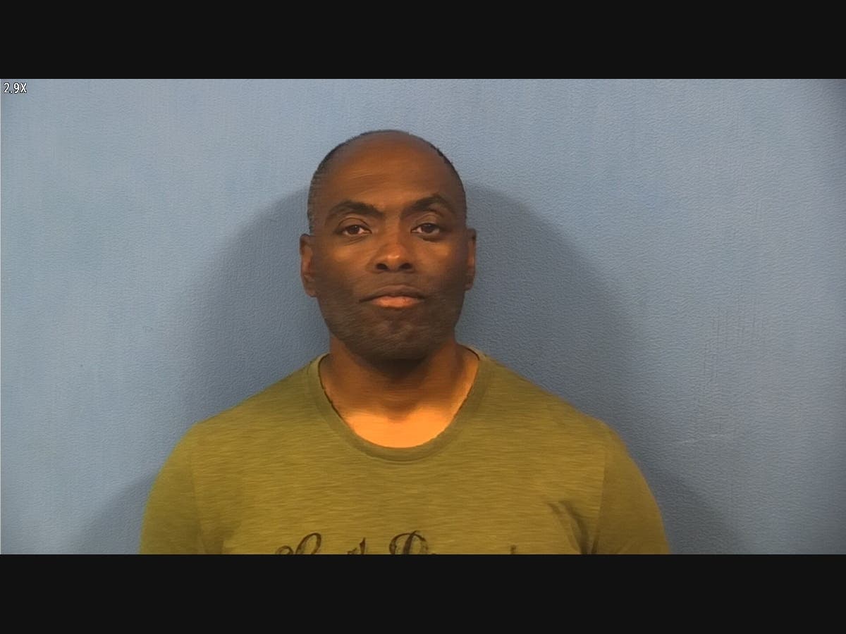 Police say Marvin Carter, 48, punched a Wheaton woman multiple times after he encountered her sitting on a bench near Prairie Path. 