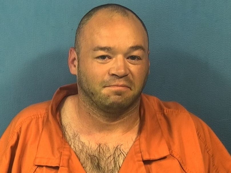 Police say Michael Vangarsse tried to enter the hospital during an altercation with security guards with a gun and 75 rounds of ammunition.