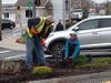 Landscape Staff members Rick Sidorowicz and Maryanne Hawkins repair damage done at site in Riverdale
