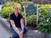 Jen Paratore of Cordaville Realty sits at the side of her Sponsor-A-Spot at the corner of Church and Court Streets.