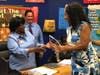 Dolton 149 Board President Darlene Gray Everett (left) presents plaque to Dr. Denita Scott who retired after 31 years.