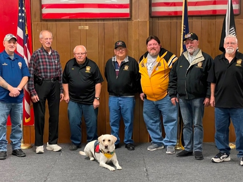 American Legion Post 618 Commander Joe Bopp, and Veterans of Foreign Wars Vesle Post 418 members John Ferguson, Rich Dercic, Ed Beliunas, Ed Carter III, Larry Joint and Bill Dawkin with Huckelberry the service dog prepare for Veterans’ Advocacy Day.