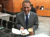 City Councilman Brad Lander walked out with a latte and a piece of butter cake in his hands. 