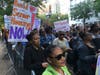 Hundreds of people rally outside Gracie Mansion Wednesday to demand Mayor Bill de Blasio fulfill a $500 million promise.