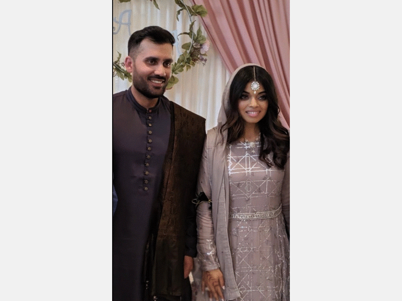 Afsha Wasi and her fiance Ahsan pose for their engagement photos.