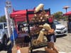 Cars were lined up 15-20 deep at three booths for giant corndogs, funnel cake, candy apples and more at the Veterans' Memorial Auditorium parking lot Saturday in San Rafael.