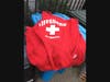 The suspect was wearing a red "LIFEGUARD" sweatshirt, dark pants and carrying a backpack or satchel, police said.