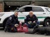 Morganville First Aid EMT's Bruce Bandler (L) and Thomas Thornbury (R) with Gunny