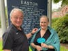 Easton First Selectman Dr. David Bindelglass pins #TealWoman Noreen Forde.