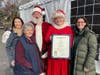 L-R State Rep. Jennifer Leeper, Barbara Roche of Fairfield, Santa Claus (Brad Baldwin) Mrs. Claus (Colleen Roche) and State Rep. Cristin McCarthy Vahey