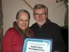 Eastonite Noreen Forde presents a certificate to Patrick Clyne, owner of The Castle on Post Restaurant & Pub.  