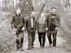 Noreen Forde walks with her family through the woods of Easton, (L-R) Brian, Gerry and Timothy Forde.  