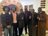 In the middle, from left to right, are Assistant Imam Simon Al Furqan of Masjid Ibrahim and Resident Imam Derrick Kareem. 