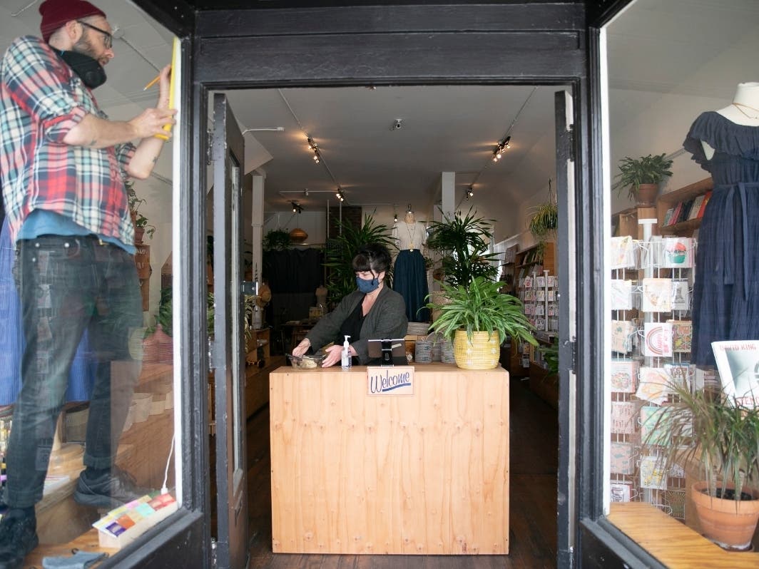 Needles and Pens owner Breezy Culbertson and her boyfriend, Scott Carl, reopen for curbside pickup on May 18, 2020.