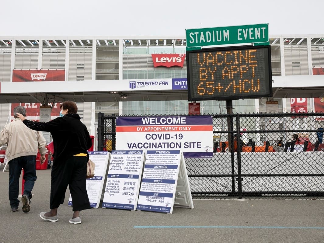 Patients enter Levi’s Stadium to receive Pfizer COVID-19 vaccines on Feb. 9 2021 in Santa Clara. 