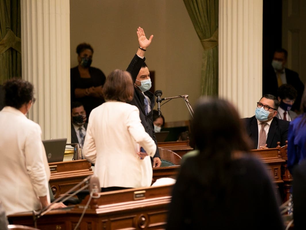 Speaker Anthony Rendon waves to the Assembly after the close of the legislative session for the year on Sept. 10, 2021. 