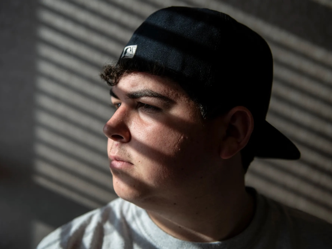 Gauge Hernandez, 16, the son of Johnny Hernandez Jr., the vice chairman of the San Manuel Band of Mission Indians, looks out window in San Bernardino on Sept. 27, 2022. Hernandez is part of a youth committee that is advocating for AB 1703, which will ensu