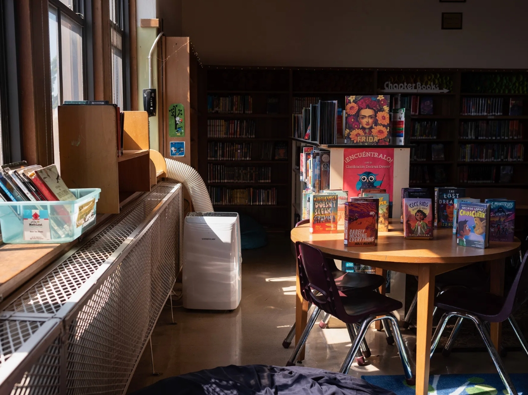 A portable AC unit in the library of the Melrose Leadership Academy in Oakland, on Sept. 23, 2024. 