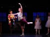 Liam Vincent Hutt alternates with Taven Blanke as Billy while Michelle Aravena as Mrs. Wilkinson looks on in Goodspeed's BILLY ELLIOT