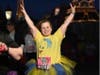 Judi crossing the finish line of the Disney Princess 5K 